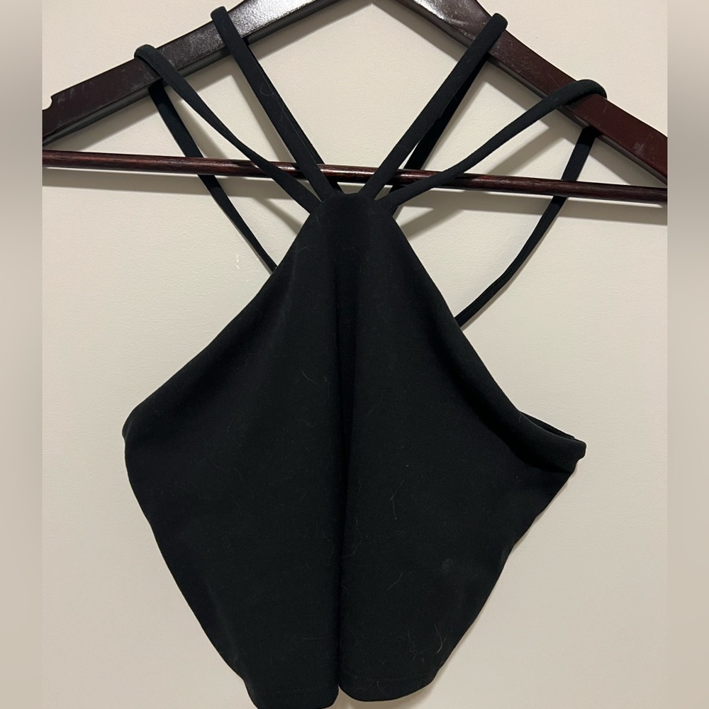 Size medium Gilly Hicks Sports Bra, Strappy and Cropped. Like New